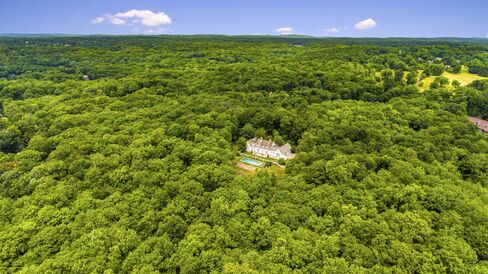 The house is surrounded by a 300-acre nature preserve.