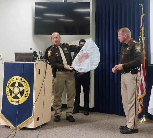 Investigators show the defective airbag from a 2002 Honda Civic believed to have killed a 17-year-old Texas girl in March.