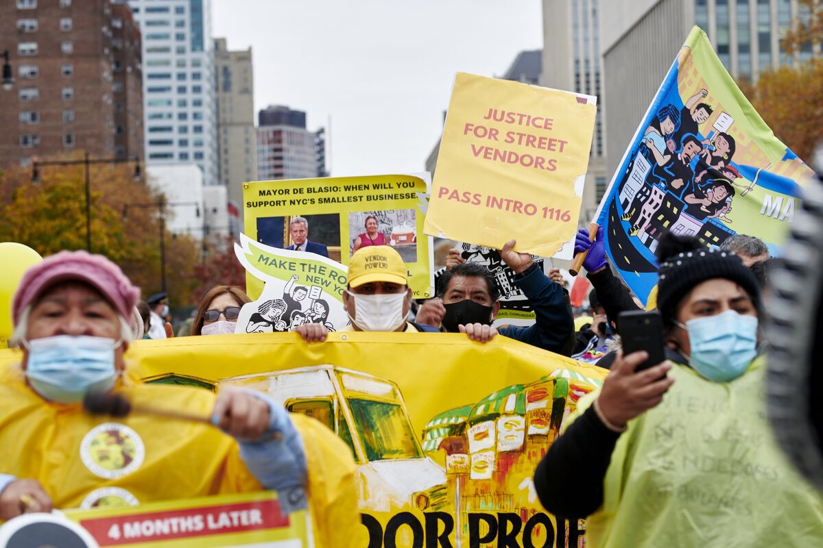 New York, United States. 09th Nov, 2020. Street vendors sell