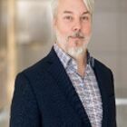 Headshot of Joel J Gustafson