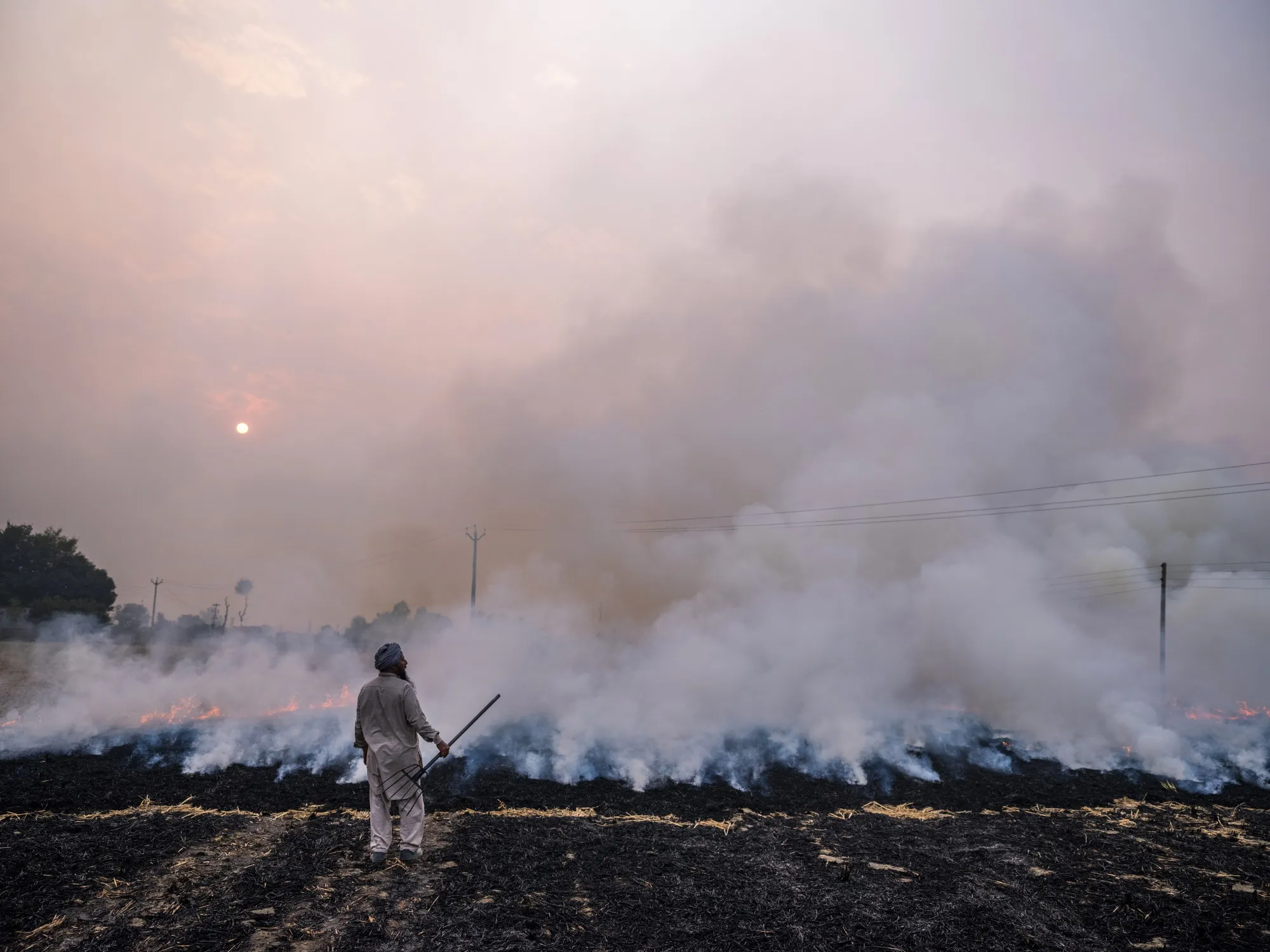 The burning of rice crop stubble in the Patiala district of Punjab.