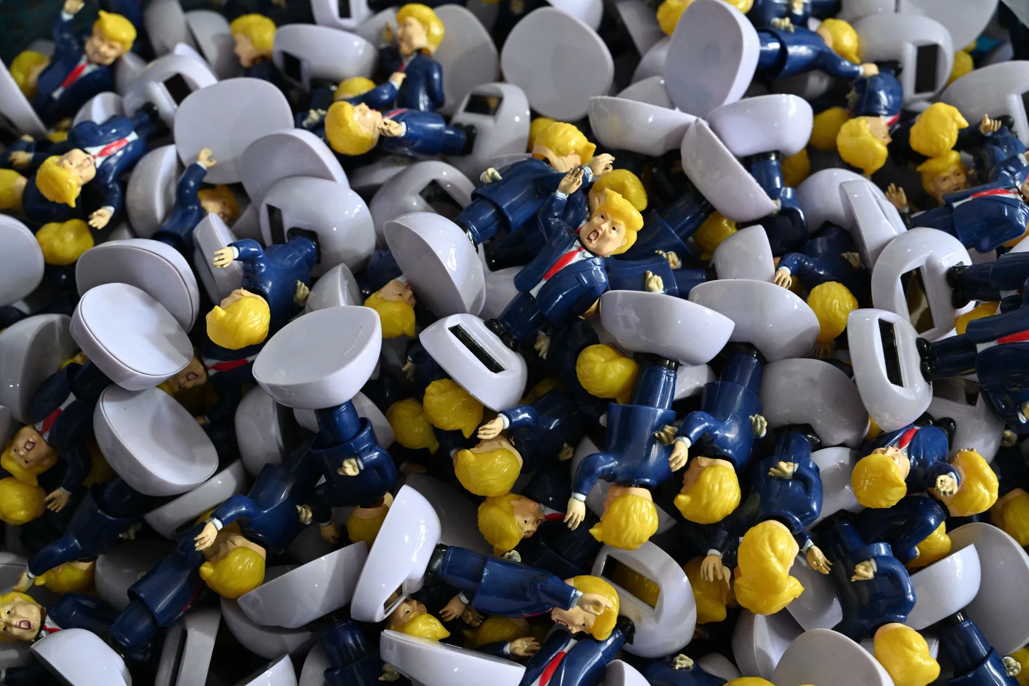 Parts for toys depicting Donald Trump at a factory specializing in solar powered plastic gadgets in&nbsp;Zhejiang province, China.