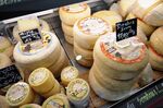 Cheese on display at a sales counter in Saint-Jean-Pied-de-Port, southern France.&nbsp;