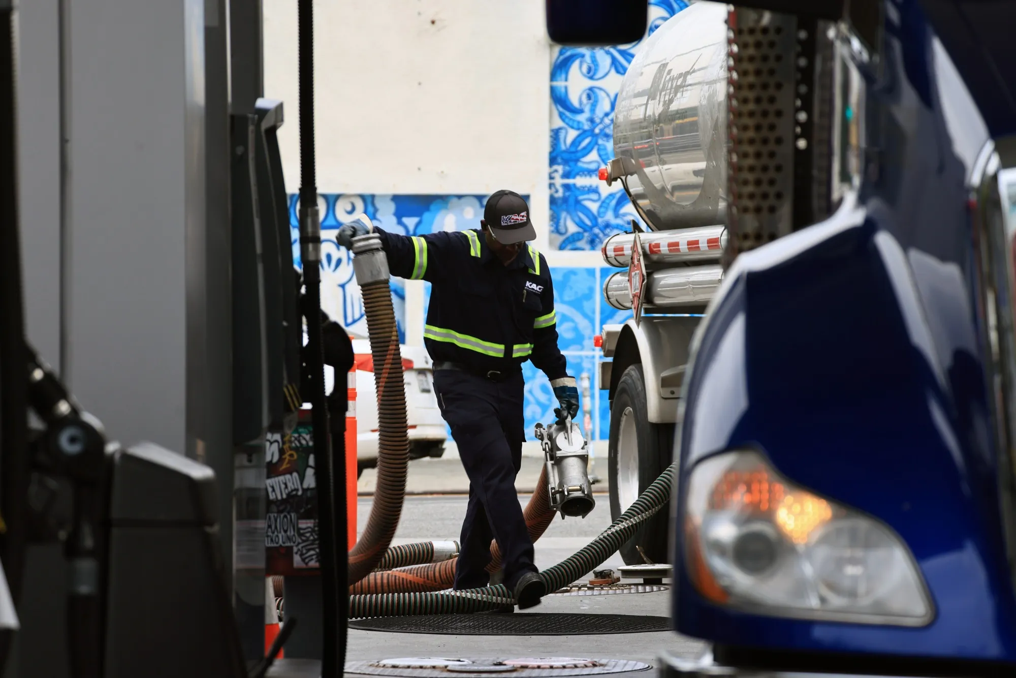 A worker at a gas station in Los Angeles. Rising gasoline prices have helped drive a surge in inflation.