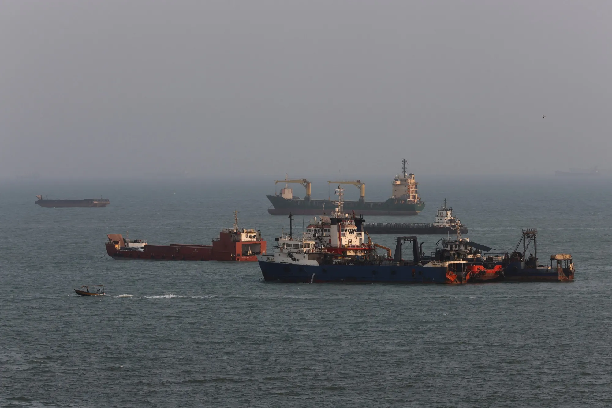 Iran, Oman reach revenue-sharing deal on Strait of Hormuz; IRGC spokesman says agreements cover each country's share of waters and revenues