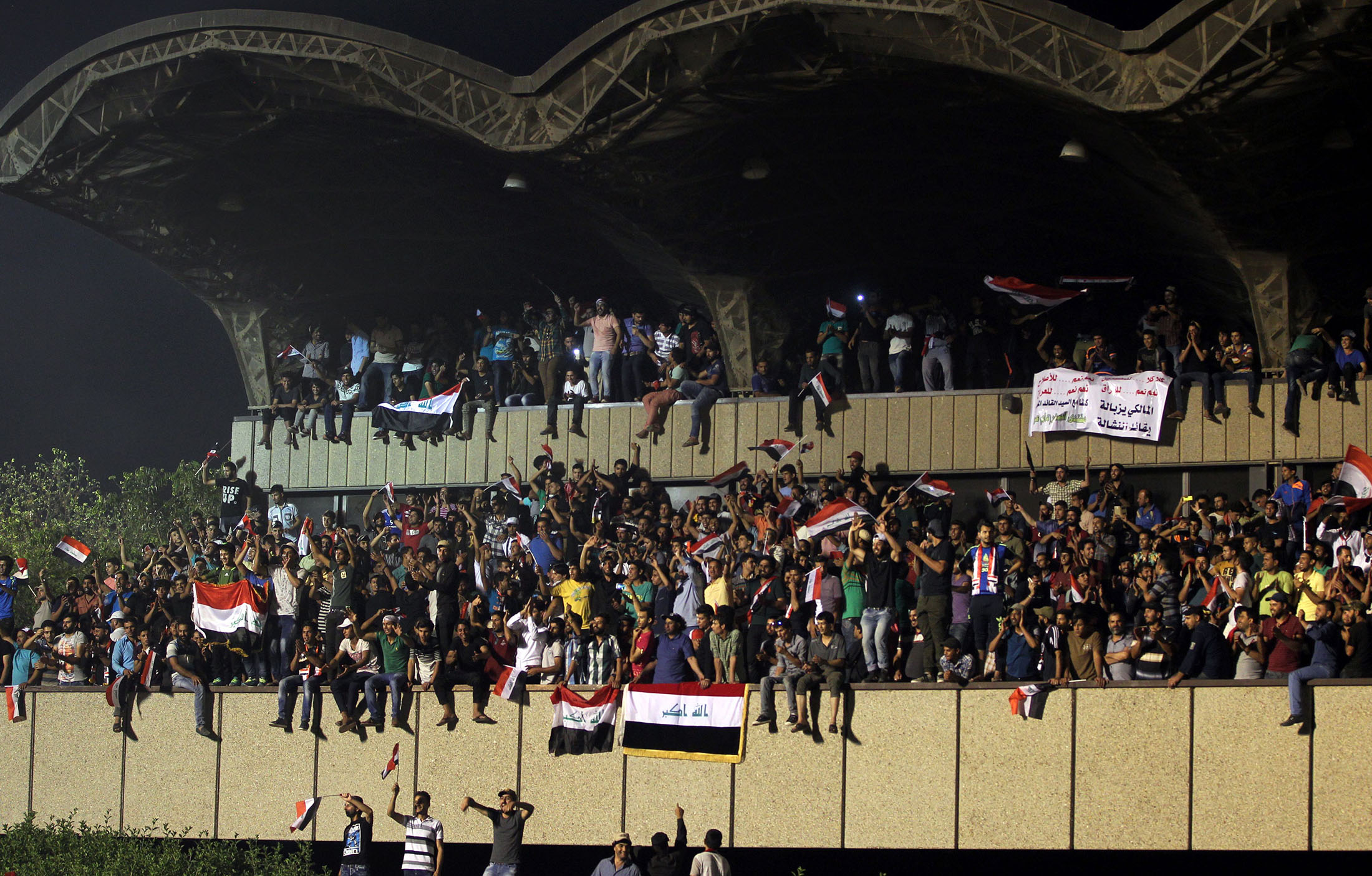 Supporters of cleric Moqtada al-Sadr gather in the courtyard of celebrations after breaking into Baghdad's heavily fortified 'Green Zone' on April 30.
