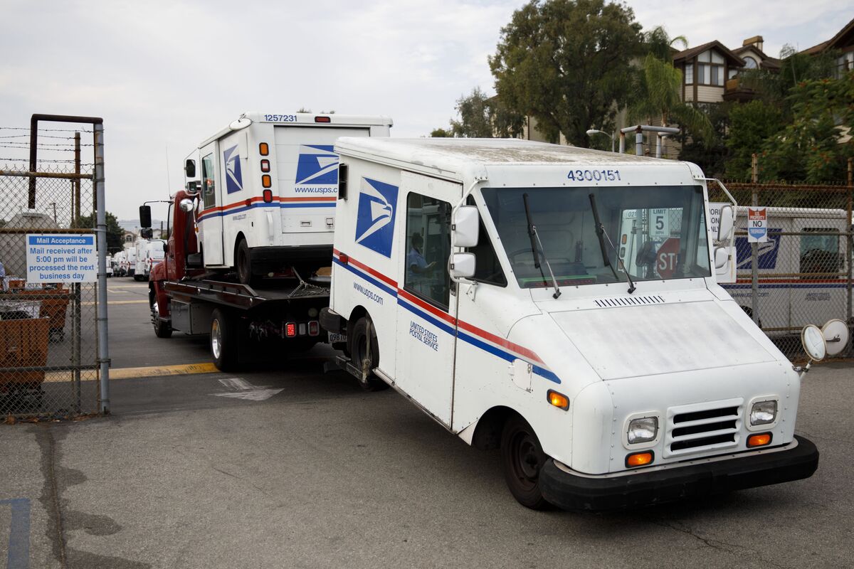 Postal Service Stirs Ire by Buying Gas Trucks and a Few EVs Bloomberg