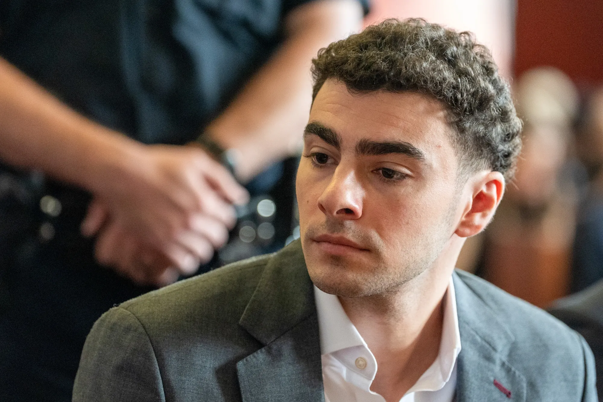 Luigi Mangione expected to plead guilty in federal case for healthcare CEO killing; appears in New York court facing stalking counts