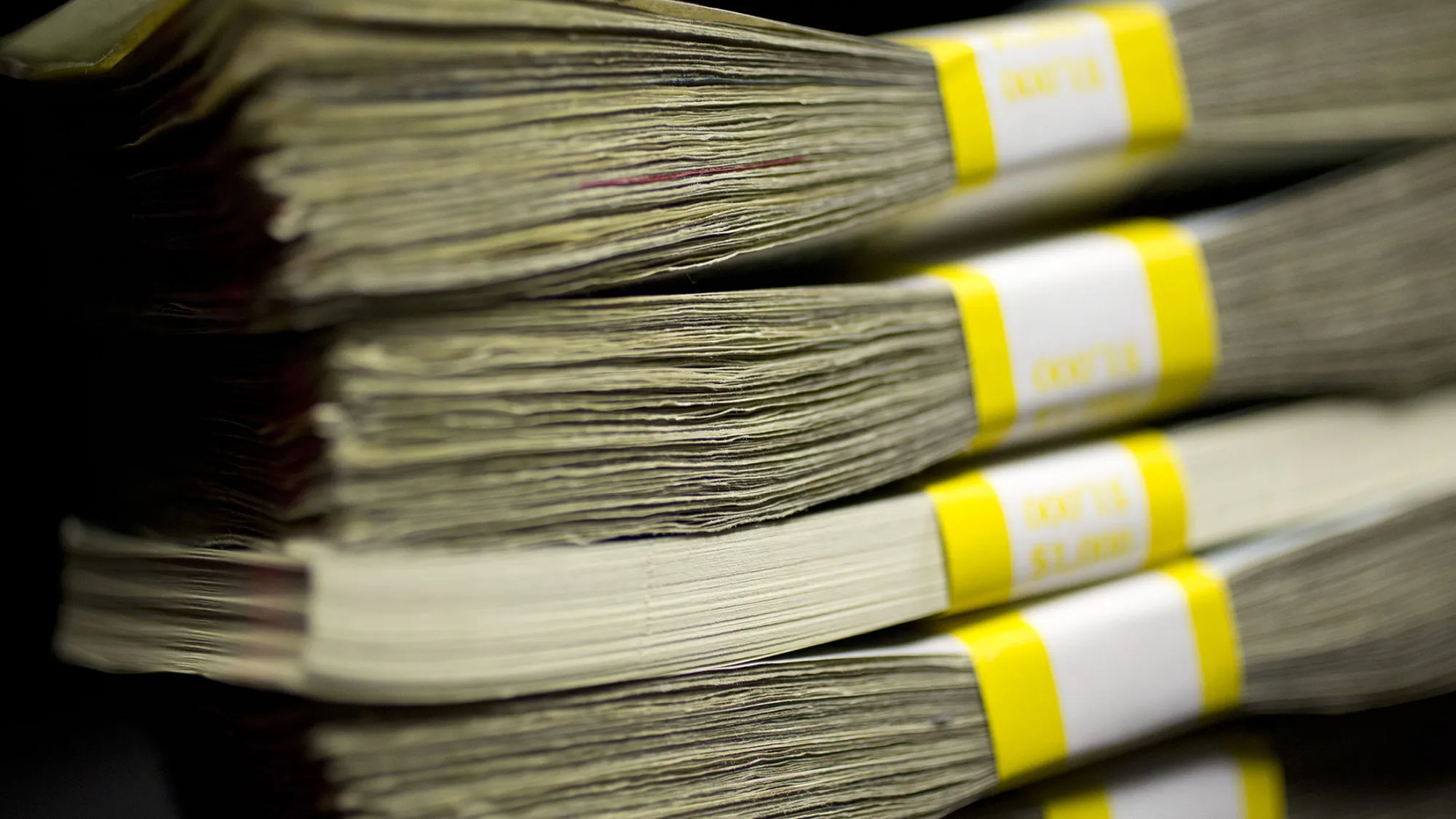 Stacks of U.S. currency are arranged for a photograph in Washington, D.C., U.S., on Thursday, Feb. 6, 2014. A suspension of the federal debt limit, enacted by Congress in October, is scheduled to expire Feb. 7. Treasury Secretary Jacob J. Lew has urged lawmakers to act quickly to raise the cap, saying the government’s ability to meet its obligations will run out before the end of this month.
