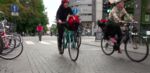 Oslo cyclists cruise down a car-free downtown street. 