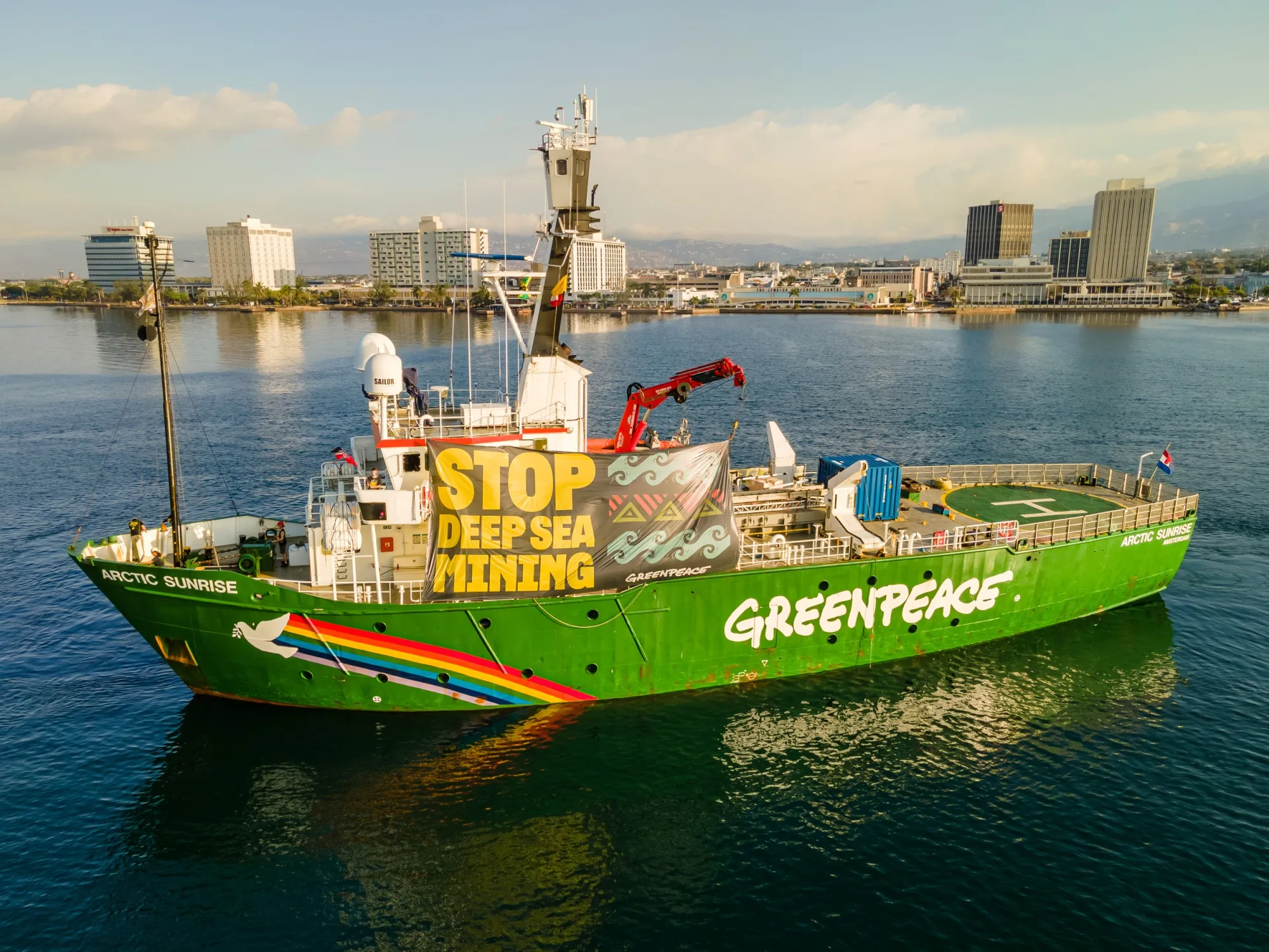 A Greenpeace vessel arrives in Kingston, Jamaica, at the start of the International Seabed Authority meeting in 2023.