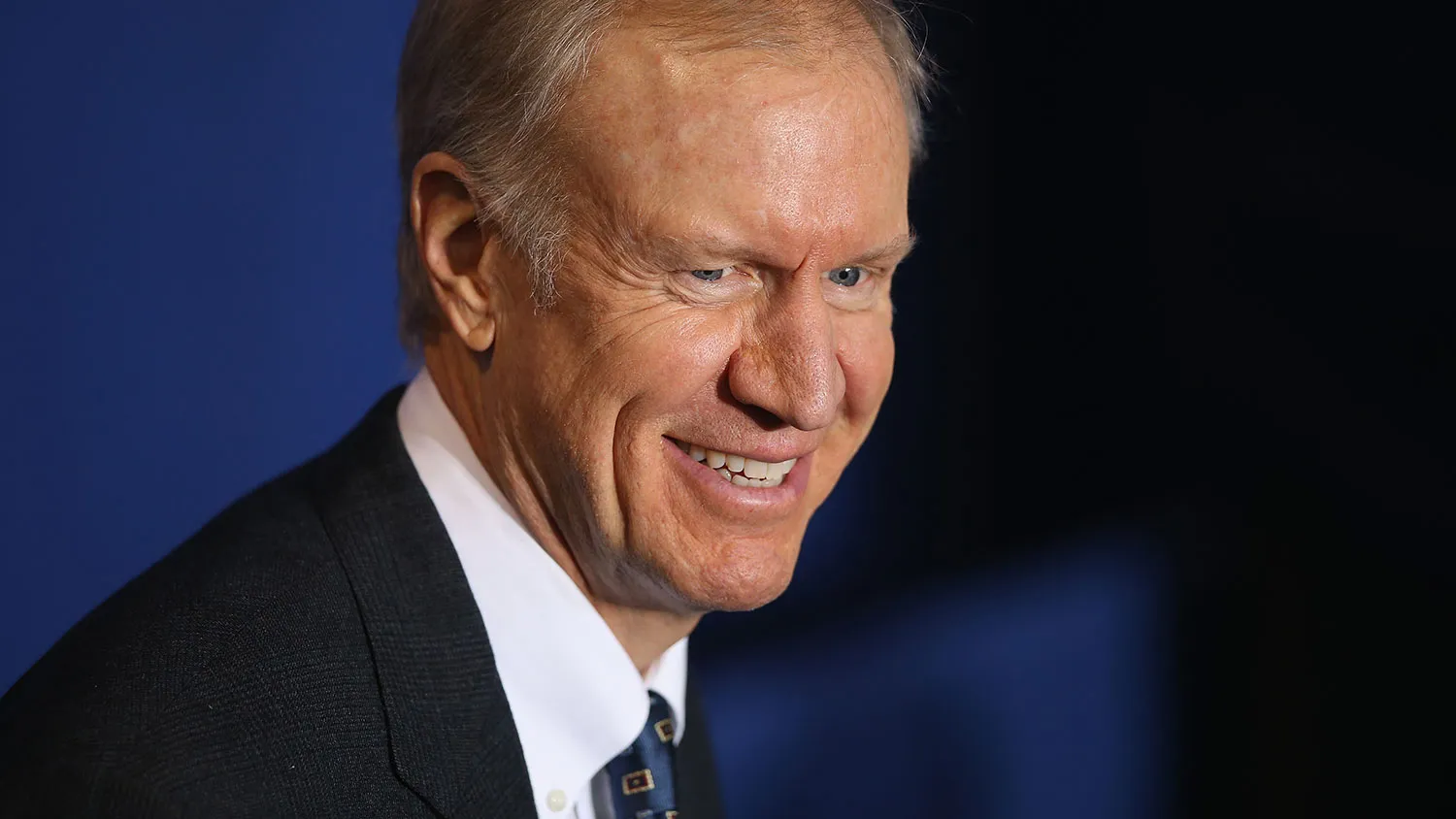 Illinois governor Bruce Rauner waits for the arrival of President Barack Obama at the Gwendolyn Brooks College Preparatory Academy on February 19, 2015 in Chicago, Illinois.
