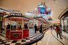 People walk past a Prada SpA pop up store inside the Galaxy Macau casino and hotel, developed by Galaxy Entertainment Group Ltd., in Macau, China, on Tuesday, Feb. 19, 2019. Galaxy is scheduled to release annual earnings on Feb. 28.