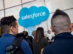 Attendees stand in the lobby area of the the Salesforce Tower in San Francisco, California, U.S., on Tuesday, May 22, 2018.