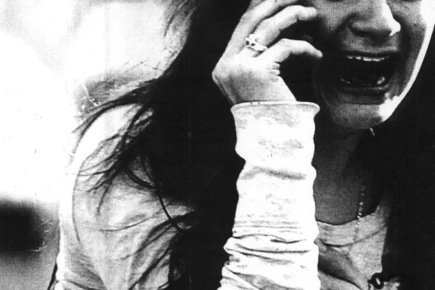 Jillian Soto tries to get information about her sister, Victoria Soto, a teacher at Sandy Hook Elementary School in Newtown, Conn., on Friday, Dec. 14