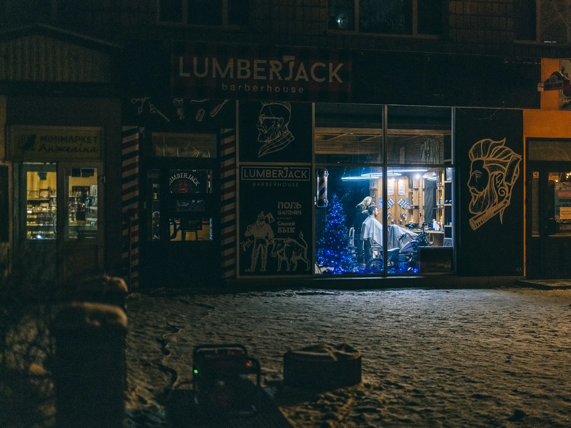 A barbershop powered by a generator remains open during a blackout in Kyiv, on Jan. 12.