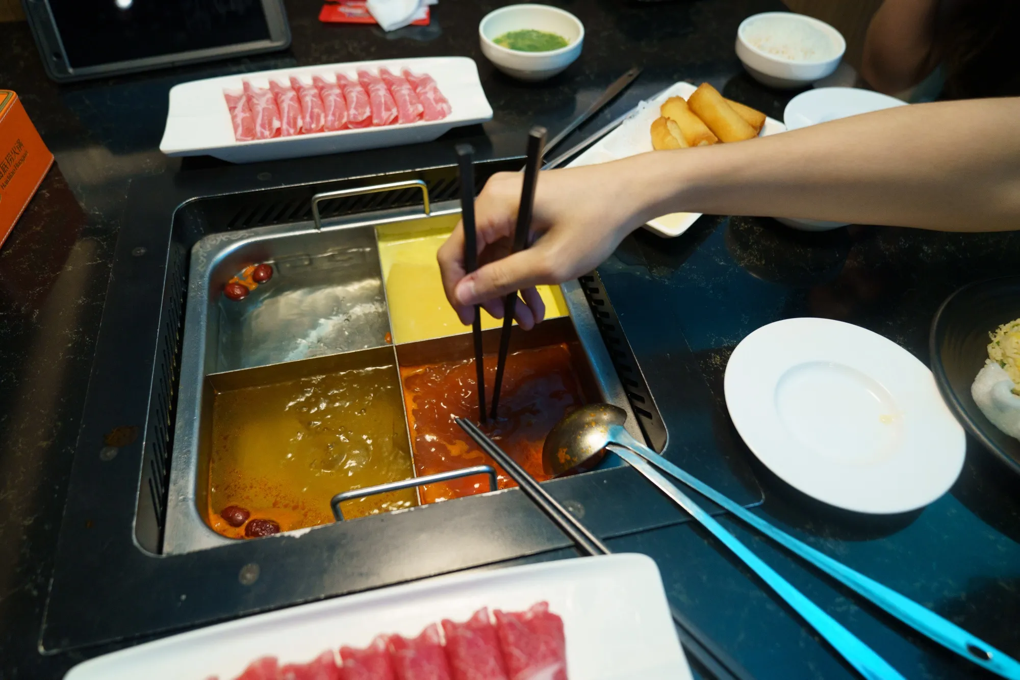 A hotpot meal at a Haidilao restaurant in Singapore.