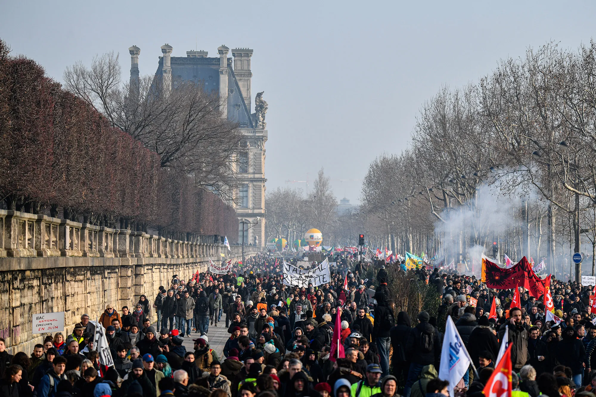 People stage a demonstration with Unions trade against the pension reform plan in Paris, France, Jan. 24.