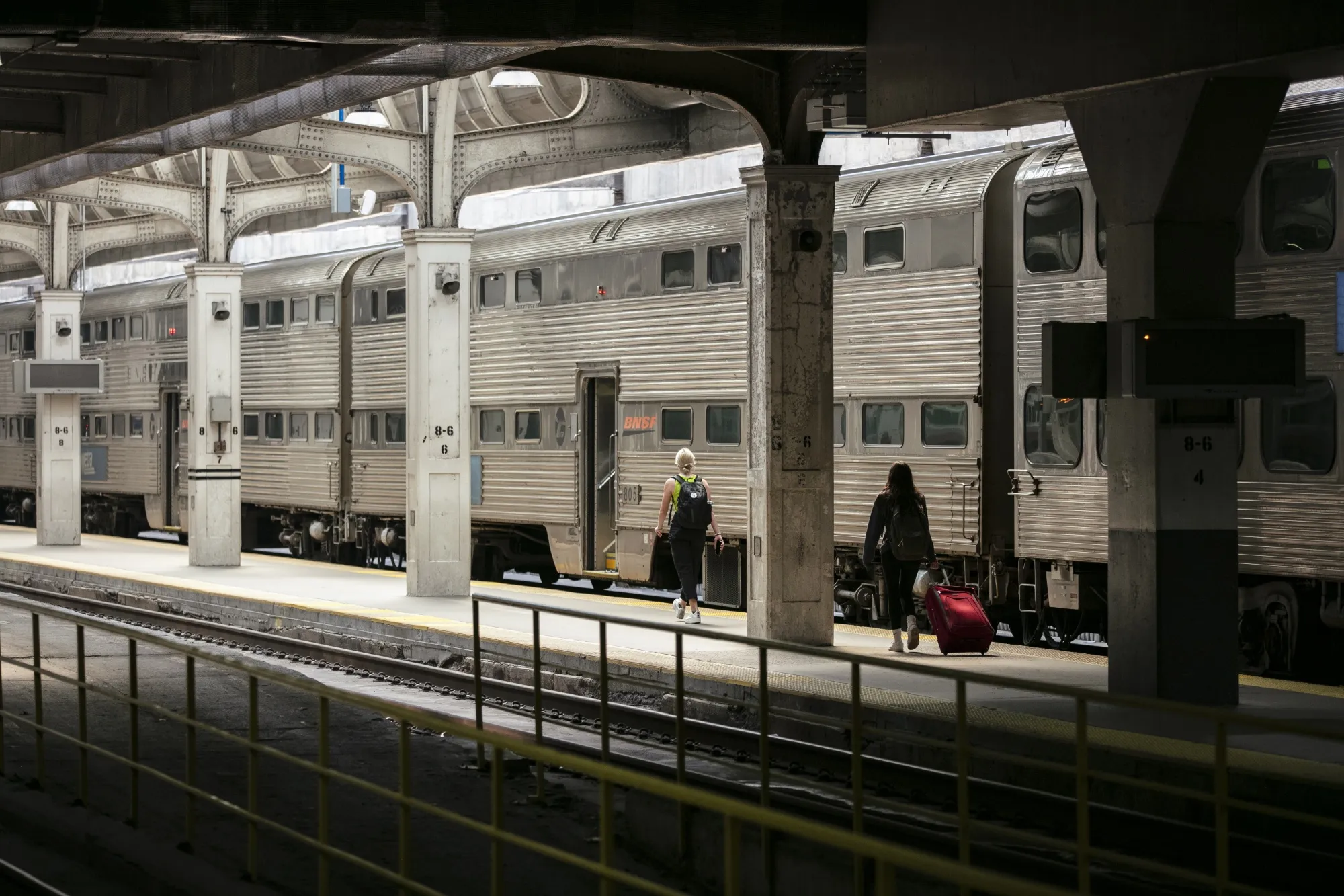 Commuters board a Metra train at Union Station in Chicago.