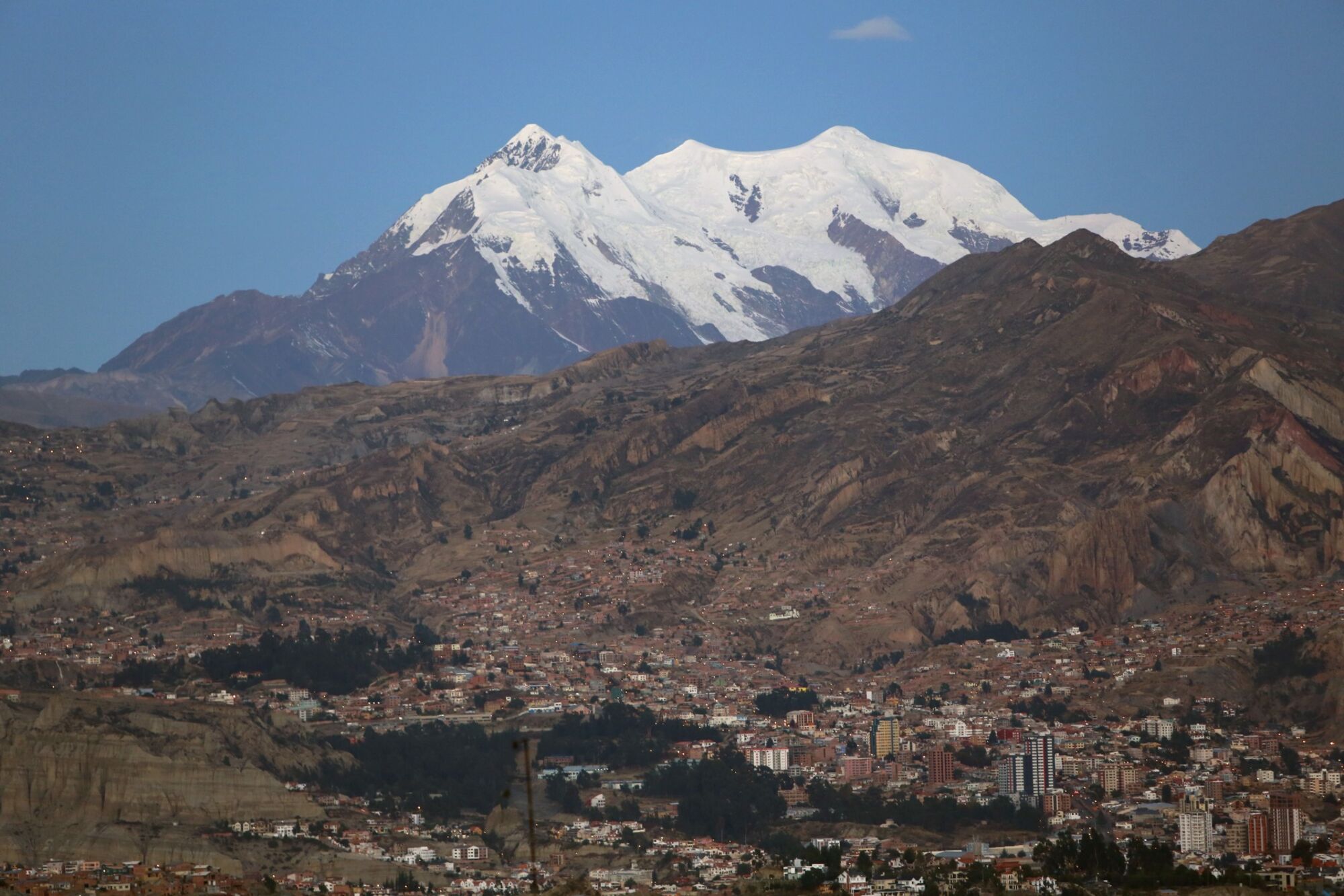 Mount Illimani looms over the city of La Paz, Bolivia.