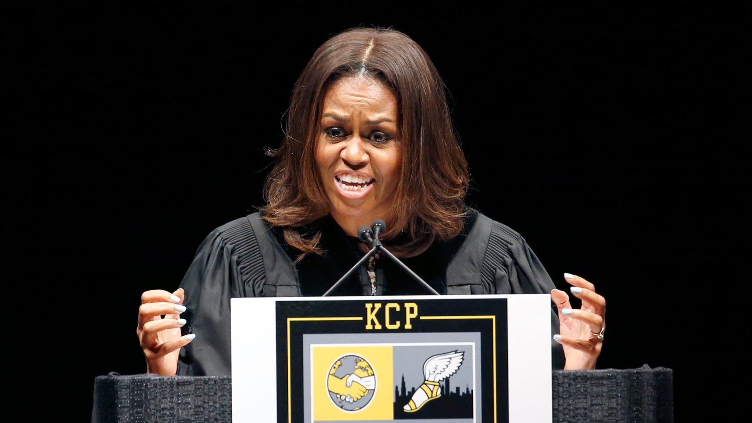 First lady Michelle Obama delivers the commencement address during graduation ceremonies for the Class of 2015 at Dr. Martin Luther King College Preparatory High School held on the campus of Chicago State University, Tuesday, June 9, 2015, in Chicago.
