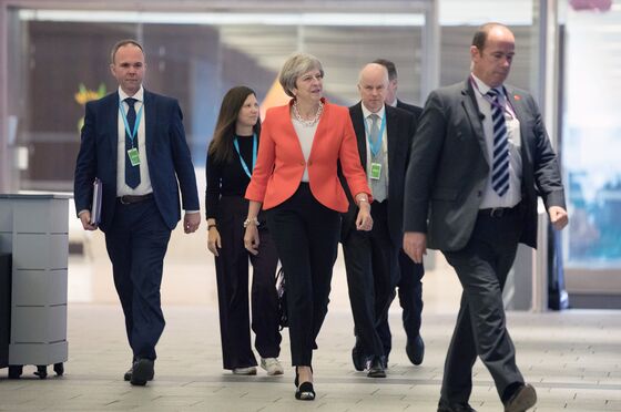 Theresa May Fights for Her Job as Tory Brexit Splits Widen