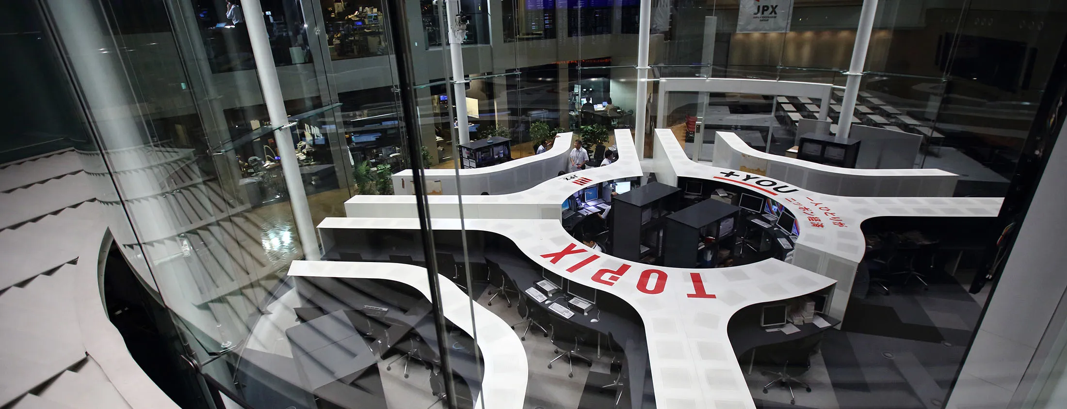 Employees work on the trading floor of the Tokyo Stock Exchange in Tokyo, Japan.
