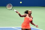 Serena Williams of the United States returns a shot to Roberta Vinci of Italy during their Women's Singles Semifinals match on Day Twelve of the 2015 US Open, on Sept. 11, in New York City.
