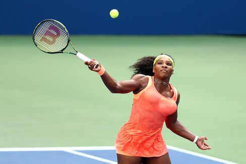 Serena Williams of the United States returns a shot to Roberta Vinci of Italy during their Women's Singles Semifinals match on Day Twelve of the 2015 US Open, on Sept. 11, in New York City.