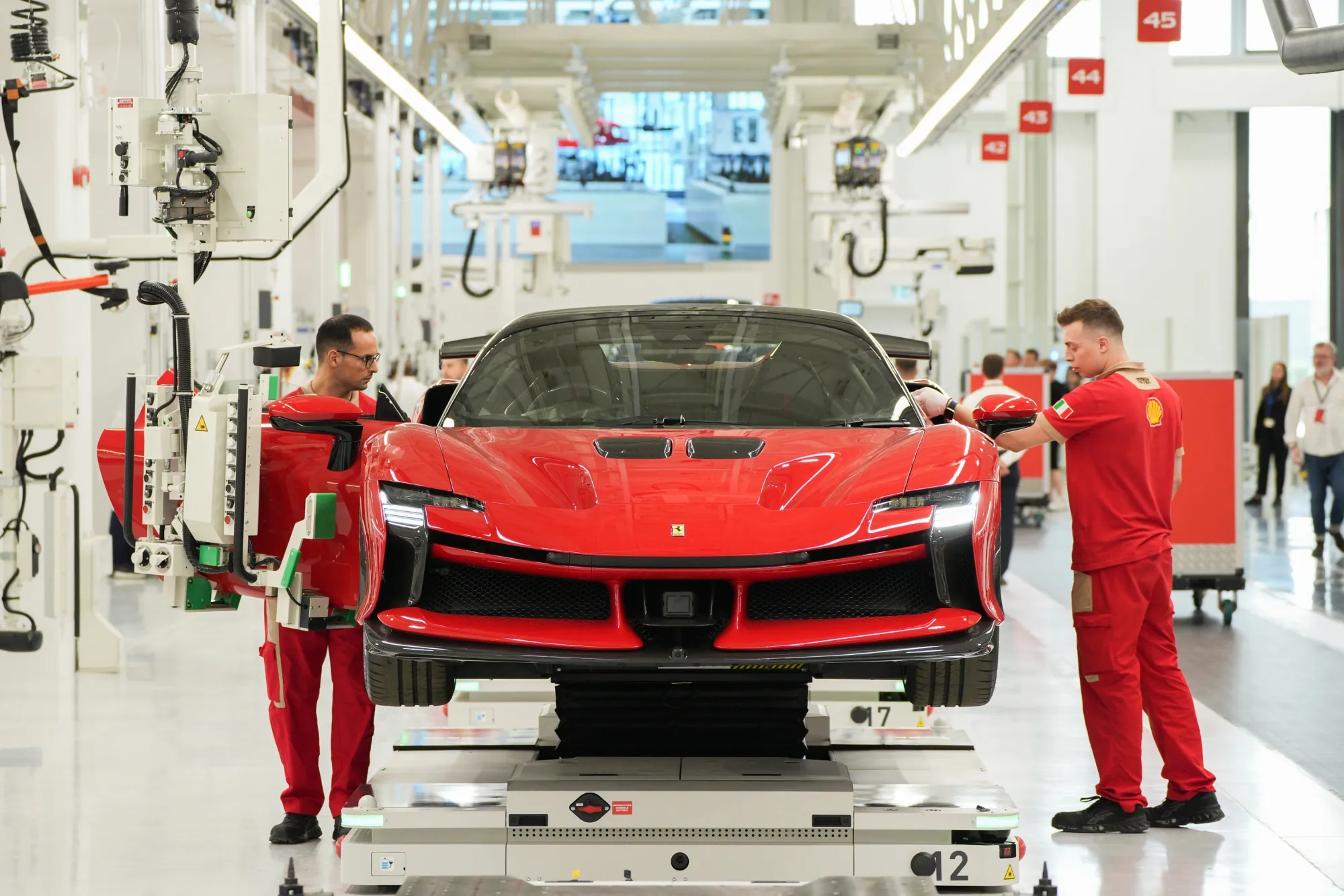 Workers on the production line at the Ferrari NV E-building factory in Maranello.
