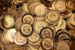 Debating Bitcoin: Will the Cryptocurrency's Merits Be Its Undoing?