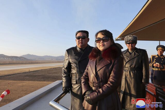 In this photo provided by the North Korean government, Kim Jong Un and his daughter observe an air force demonstration to commemorate the "Day of Airmen" in North Korea, in November 2023. 