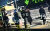 Pedestrians are reflected in an electronic stock board outside a securities firm in Tokyo, Japan, on Tuesday, Feb. 6, 2018. Japan's broad Topix index and blue-chip Nikkei 225 Stock Average were poised to enter a correction as the nation's shares headed for the biggest decline since June 2016, following U.S. peers lower amid rising concern that inflation will force interest rates higher.