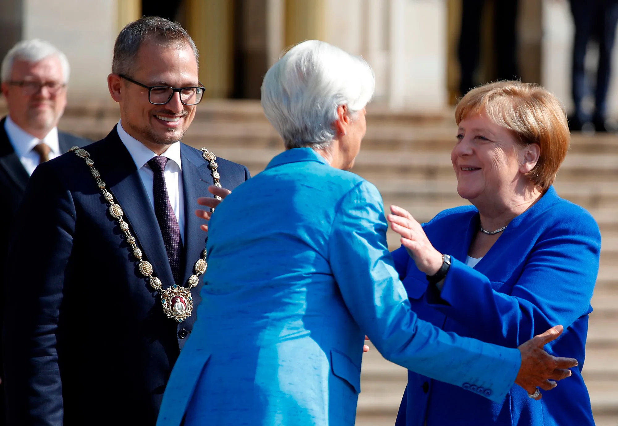 Angela Merkel greets Christine Lagarde as they arrive for a ceremony in&nbsp;Leipzig&nbsp;Aug.&nbsp;31.