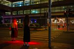 LED lights illuminate a crossing point in Hong Kong in an&nbsp;initiative aimed at reminding pedestrians to stop.