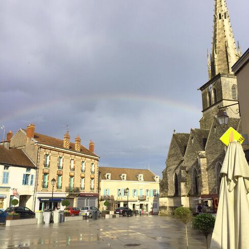 A rainbow over the picture-perfect town square in Meursault, a town known for its high quality Chardonnays.
