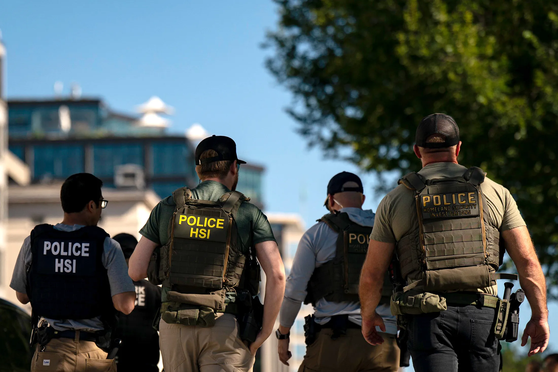 Agents from the US Immigration and Customs Enforcement's Homeland Security Investigations (HSI) unit during a traffic stop near the White House in Washington, DC,&nbsp;on&nbsp;Aug. 26.