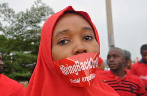 A Woman Attends A Demonstration In Abuja