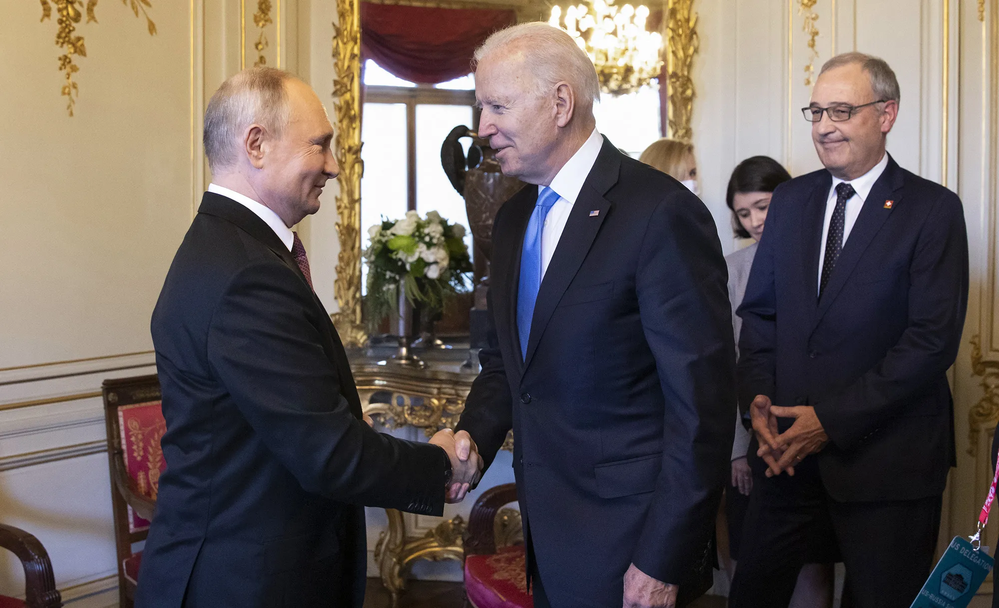 Vladimir Putin and Joe Biden shake hands during the U.S.-Russia summit at Villa La Grange in Geneva on June 16.&nbsp;