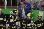 Michigan hockey coach Mel Pearson is seen during the second period of the Great Lakes Invitational college hockey championship game, Tuesday, Dec. 31, 2019, in Detroit. The University of Michigan has cut ties with hockey coach Mel Pearson. The school announced its decision on Friday, Aug. 5, 2022 Pearson's contract expired after last season and he had been an at-will employee, pending a review of the program.(AP Photo/Carlos Osorio, File)