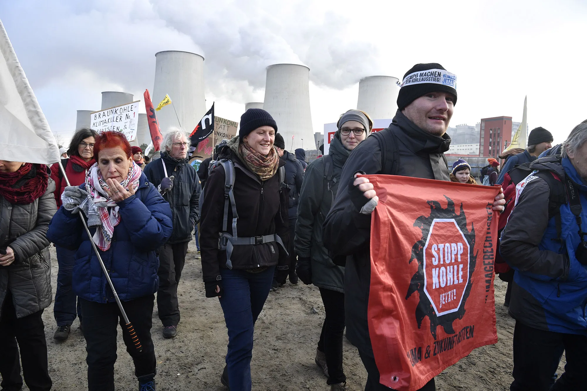Climate activists during a demonstration in front of the Jaenschwalde power plant in Germany on Nov.&nbsp;30.