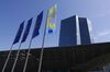 The stars of the European Union (EU) sit on banners as they fly alongside a banner commemorating the 20th anniversary of the euro currency outside the European Central Bank (ECB) headquarters following a rates decision news conference with ECB President Mario Draghi in Frankfurt, Germany, on Thursday, July 25, 2019. The ECB sent its strongest signal yet that monetary support for the euro-area economy will be stepped up after the summer break, with lower interest rates and renewed asset purchases on the table.
