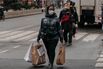 Last-Minute Shoppers Hit The Stores On Christmas Eve