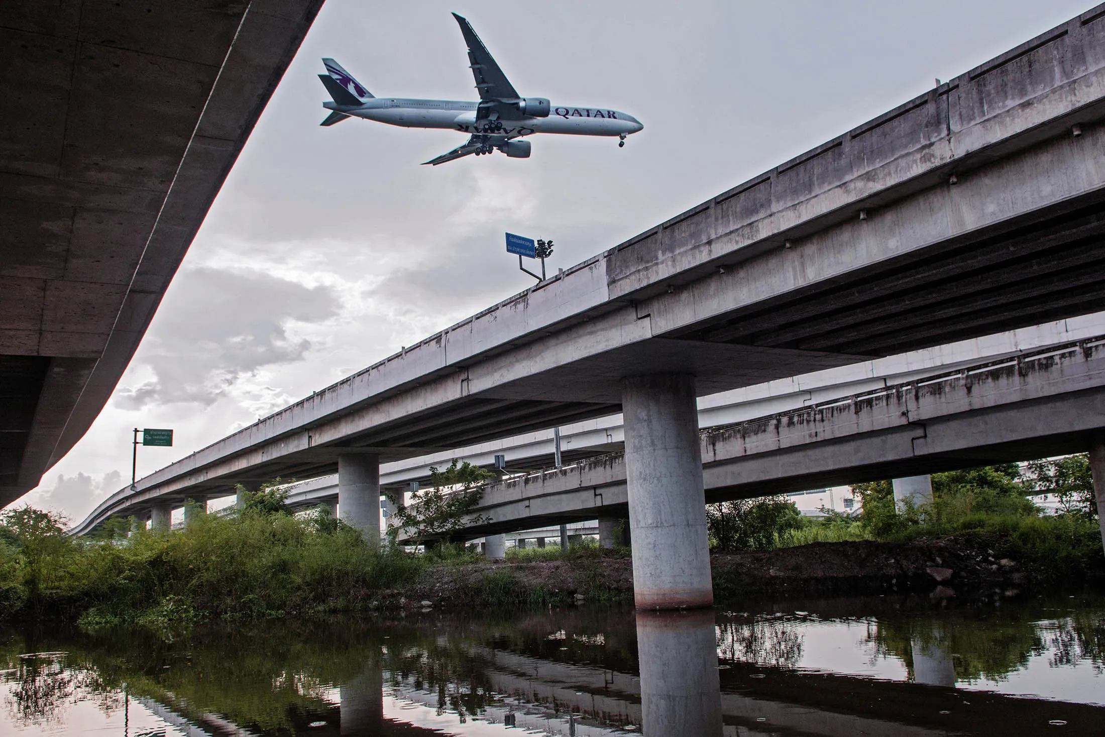 A plane makes its approach to Suvarnabhumi Airport in Bangkok. Thailand is spending about $83 billion over the next seven years to build new railways, roads and customs checkpoints to remove bottlenecks that hamper trade with its neighbors.
