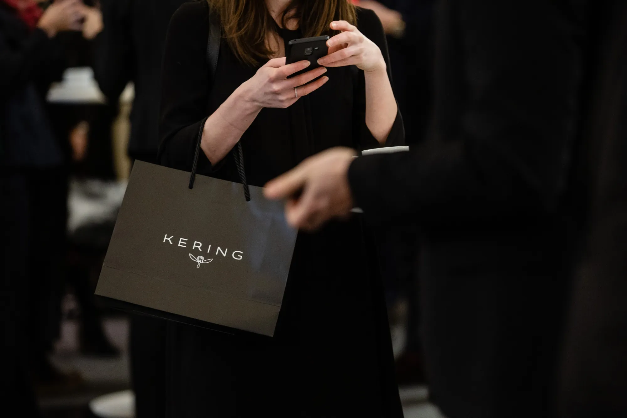 A Kering branded gift bag.