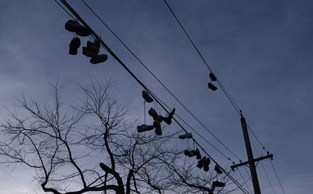 sneakers on telephone wires