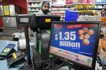 A Mega Million sign displays the estimated jackpot of $1.35 Billion at the Cranberry Super Mini Mart in Cranberry, on, Jan. 12.