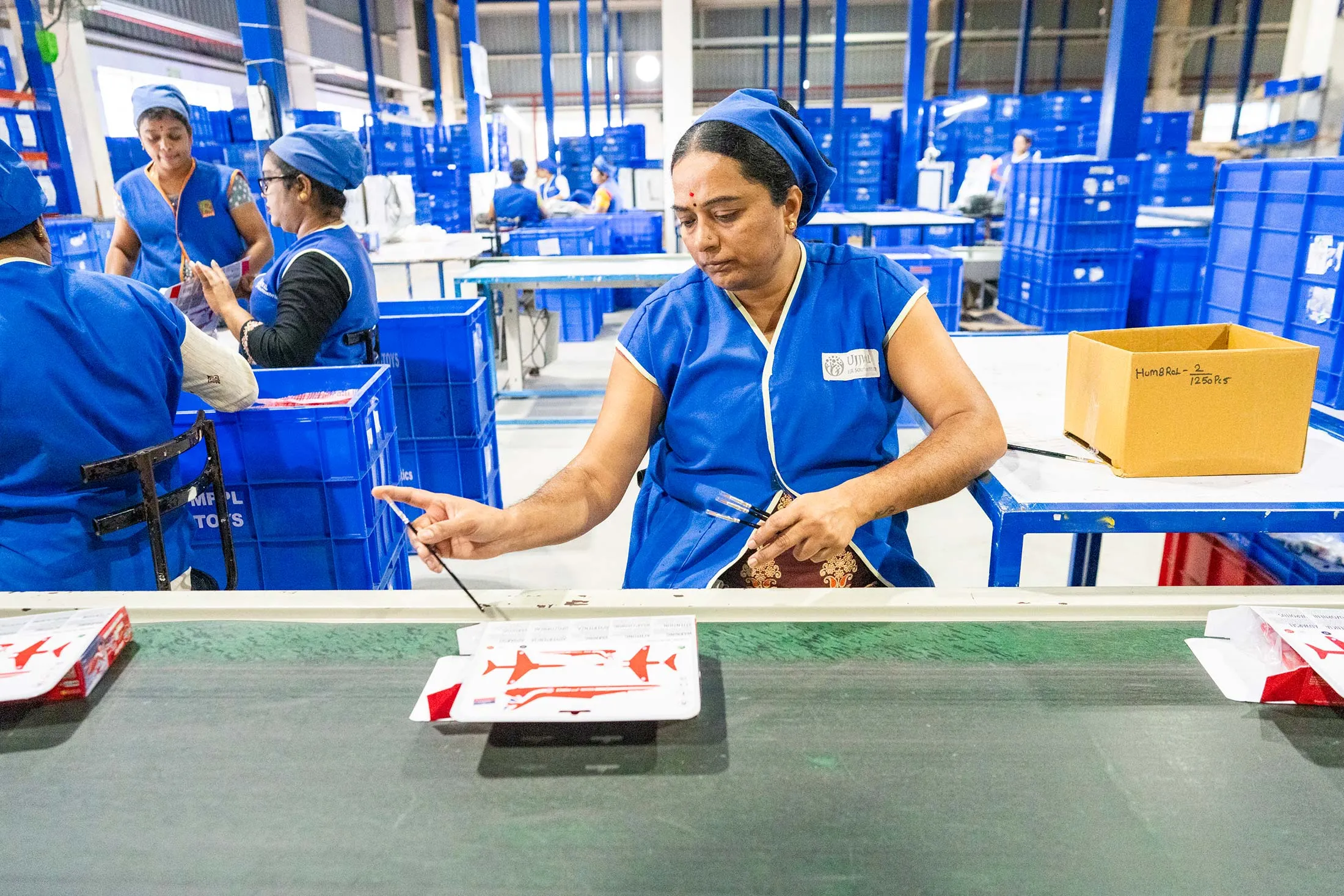 Workers assemble toy parts at the Micro Plastics Pvt Ltd Warehousing facility in Harohalli Industrial Area, Karnataka, India, on&nbsp; Dec. 3, 2025.