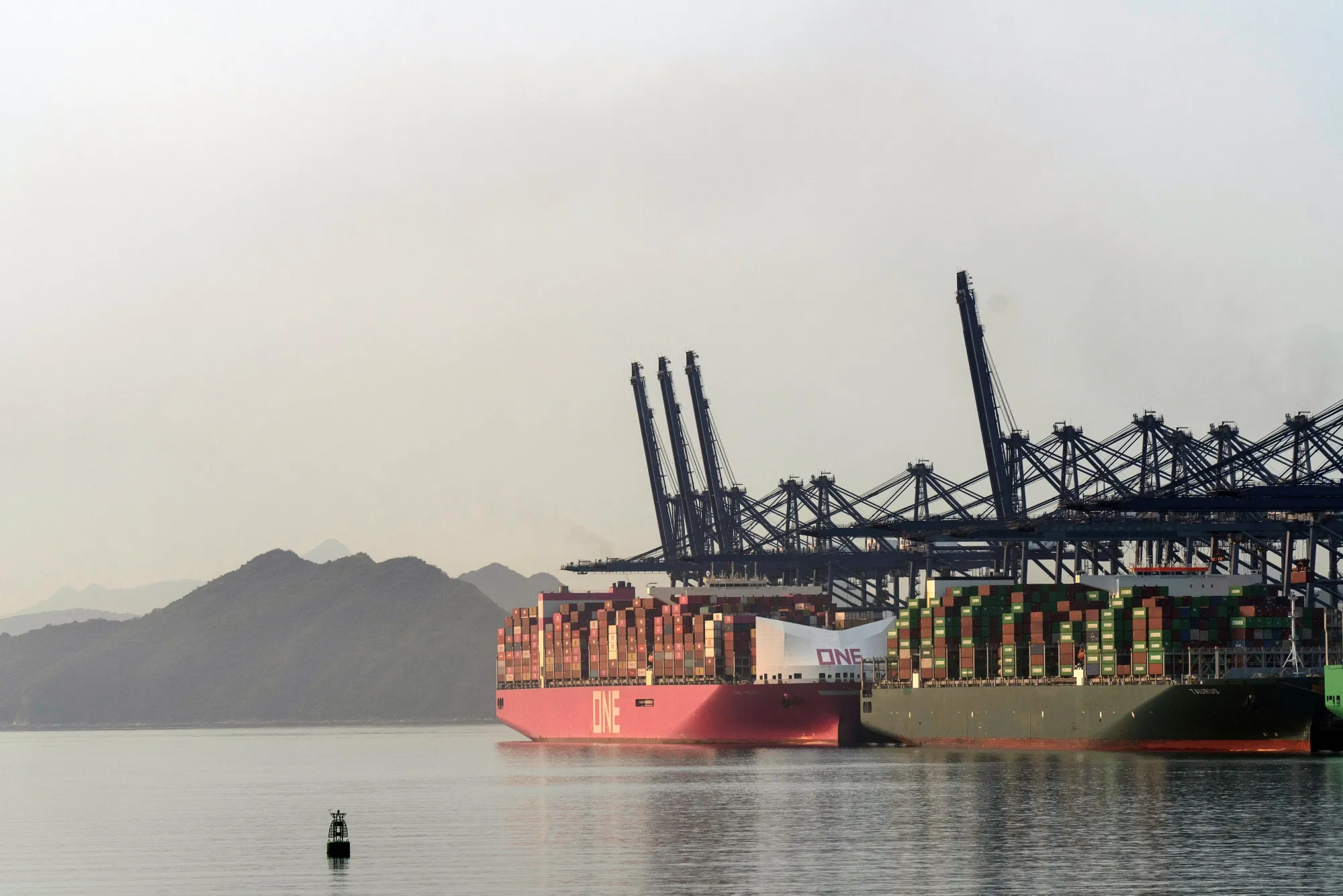 Ships at the Yantian International Container Terminals, operated by CK Hutchison Holdings Ltd.'s Hutchison Port Holdings Trust, in Shenzhen, China.