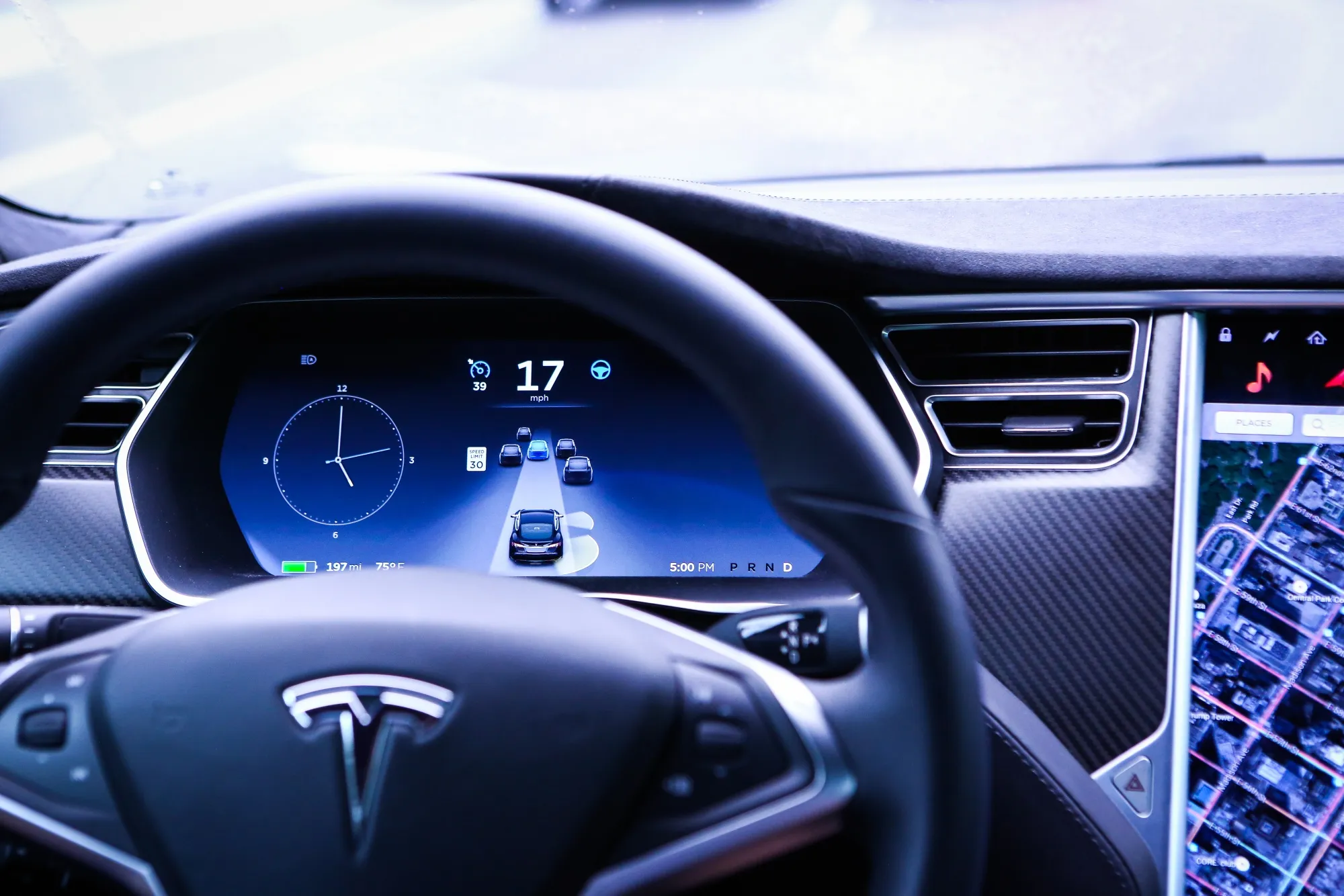 An instrument panel illustrates the road ahead using Autopilot technology just prior to the Tesla Motors Inc. 8.0 software update inside a Model S P90D vehicle.